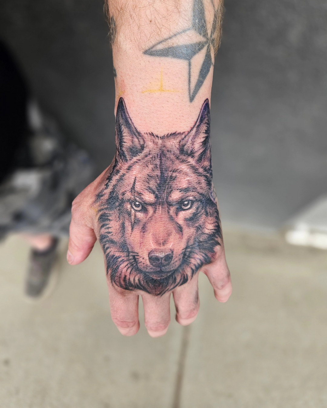 Wolf Hand Tattoo — Clay Walker